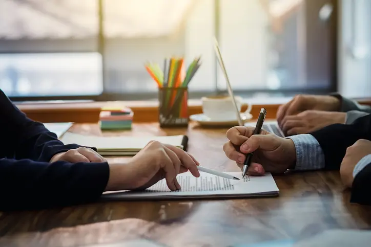 Small business attorney meeting with client